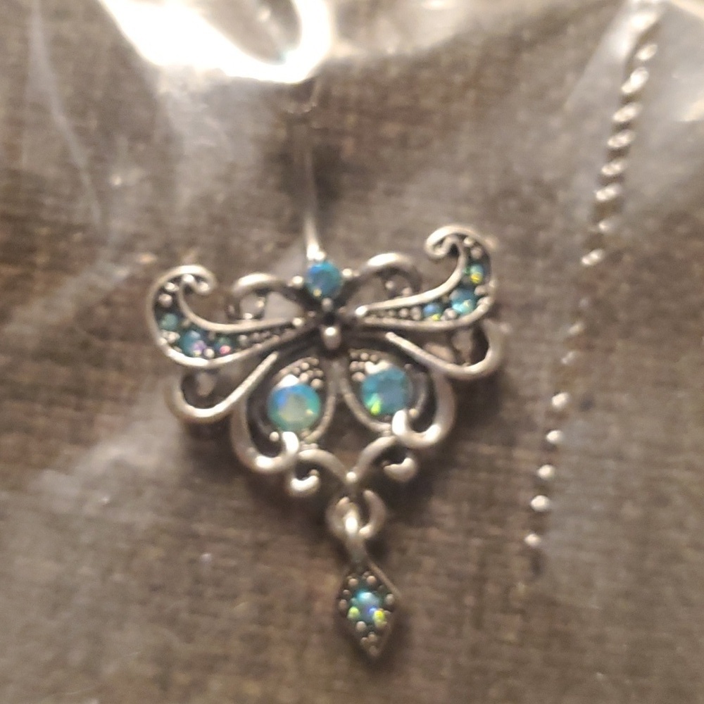 STAINLESS BELLY BUTTON RING W/ GEMSTONES